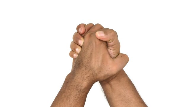 two hands clasped together, with fingers interlocked isolated on white background