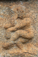 A carved statues . at the Buddhist stupa complex at the Gadaladeniya 