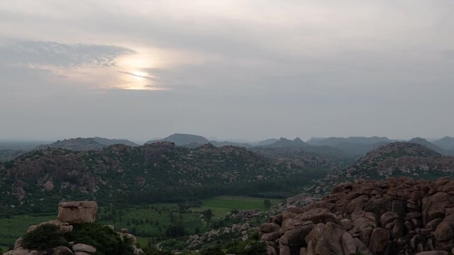 Sunset from Anjaneya Hill, Birth Place of Lord Hanuman in Hampi, Karnataka, India (Timelapse, PANNING)