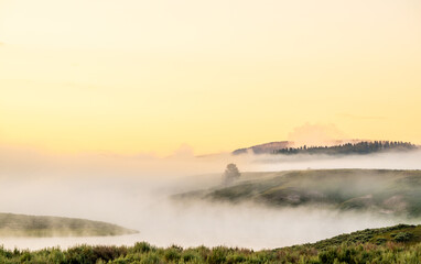 HIlls Emerge From Thick Fog Along Yellowstone River