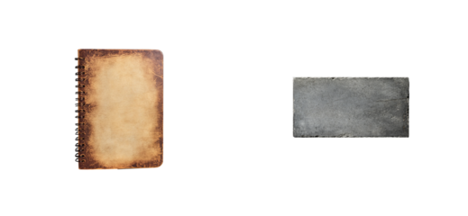 Aged notebook and concrete block on a black void, cut out