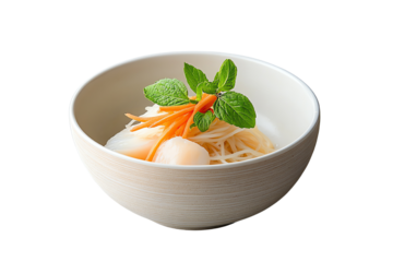 Delicious bowl of noodles garnished with carrots and mint leaves, served on a white isolate background.