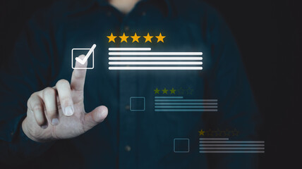 A person interacts with a digital rating system, selecting five stars on a virtual interface, symbolizing high customer satisfaction.