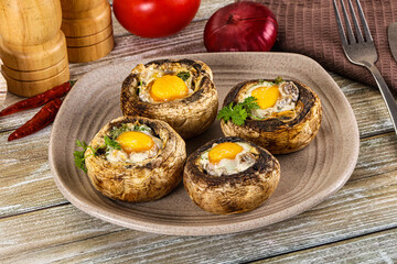 Baked champignon with quail egg