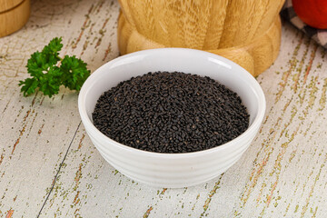 Black dry Nigella seeds in the bowl
