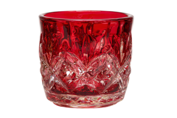 a red glass with a diamond pattern on it