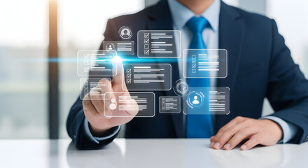 Business professional using futuristic digital interface with holographic data charts and icons in modern office setting for technology and innovation concepts