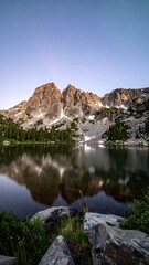 Fototapeta premium Mountain lake serene sunrise