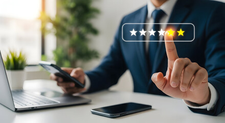 Business professional giving a five star rating on a digital device in a modern office setting for customer feedback or service review