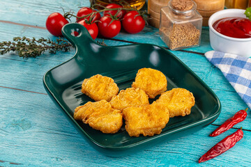 Golden crispy fried chicken nuggets