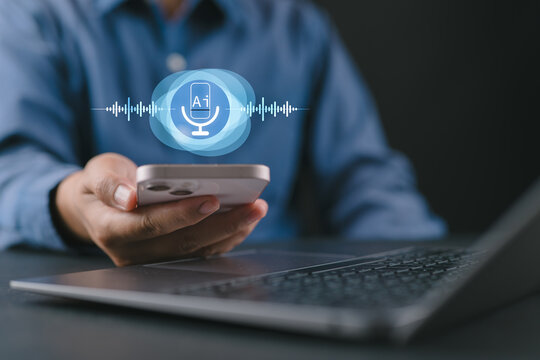 Businessman with virtual icon. AI voice assistant concept. Talking personal assistant, smartphone voice application, AI and voice controlled chatbot.