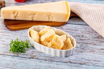 Parmesan cheese pieces in the bowl