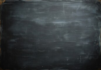 Empty used black chalkboard with chalk residue and scratches on surface