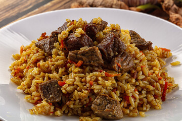 Asian traditional pilaf with beef