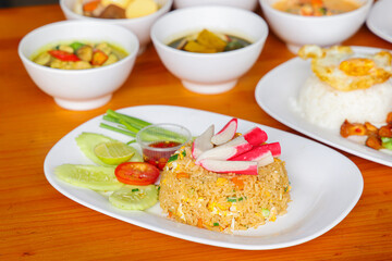 Savory Culinary Delights: A vibrant assortment of delectable dishes, with a beautifully arranged plate of flavorful fried rice.