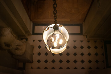 Vintage Hanging Lamp with Geometric Tiled Floor