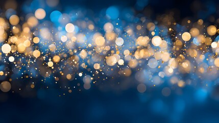 A beautiful abstract background featuring shimmering golden and blue bokeh lights, creating a festive and dreamy atmosphere