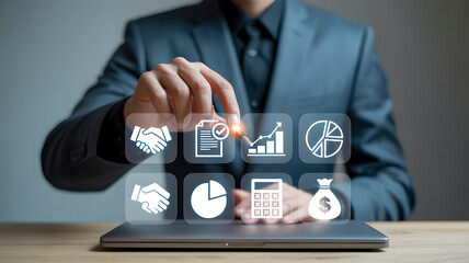 Dynamic businessman selects digital icons for financial growth, successful deals, and business analytics on virtual interface