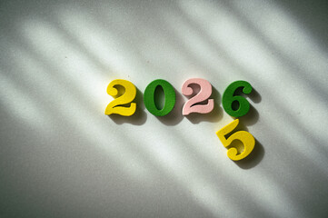 Colorful Wooden Numbers Representing New Year 2026 Celebration
