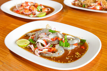 Seafood Delights: a close-up shot of vibrant and appetizing seafood dishes, capturing the essence of culinary expertise. Each dish bursts with flavor and texture, showcasing a culinary symphony