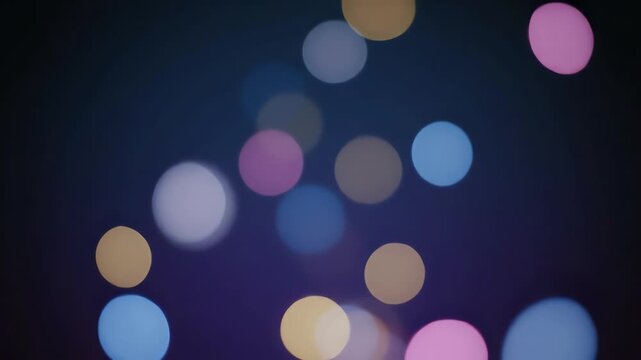 Abstract bokeh light circles gently floating and blurring in a seamlessly looping ethereal dark background title card, abstract motion, seamlessly looping
