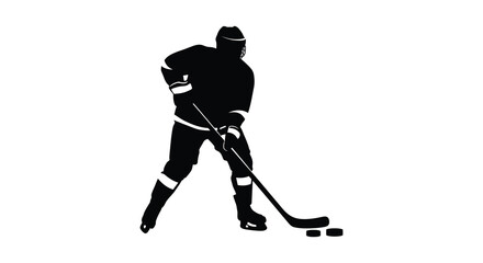 Fototapeta premium Silhouetted hockey player in action poised with stick and puck