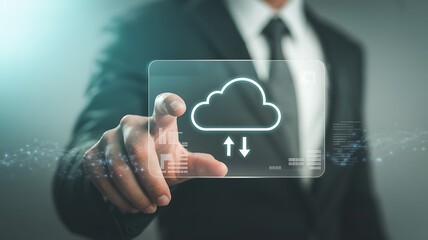 Businessman interacting with holographic cloud storage interface representing digital data upload and download technology and smart connectivity