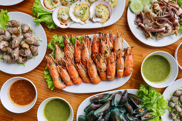Sumptuous Seafood Feast: An overhead perspective showcases a delightful assortment of freshly...