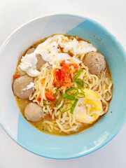 A Close-Up View of a Steaming Bowl of Instant Noodles