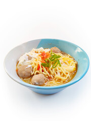 Asian-Style Spicy Noodle Bowl with Savory Broth, Meatballs, and Egg
