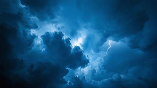 Stormy Sky Spectacle: A breathtaking panorama of dark, dramatic clouds in a midnight blue ambiance, punctuated by a powerful lightning strike, capturing the raw energy of a powerful thunderstorm.