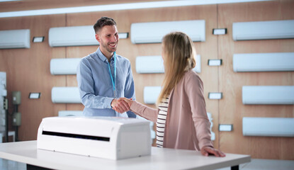 Professional Consultant Assisting Young Couple