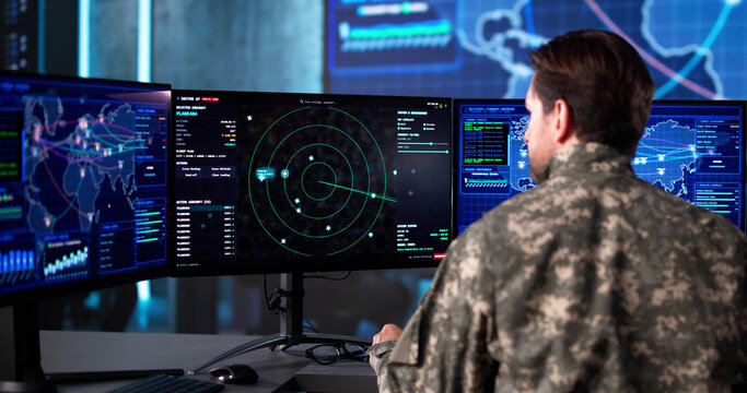 Senior Army Officer Analyzing Aerial Surveillance Data