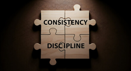 Key to success consistency and discipline puzzle pieces connect
