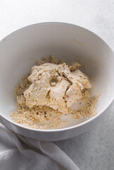 Overhead view of fire crackers dough in a bowl, top view of spicy cracker dough, process of making fire crackers