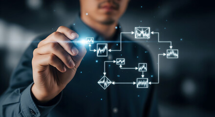 Man draws glowing flowchart data analysis process for business success