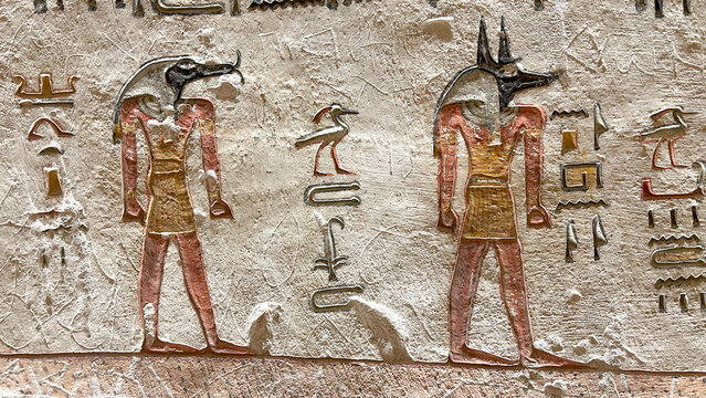 Relief of Anubis and Thoth with hieroglyphics in Tomb of Ramesses V and VI KV9