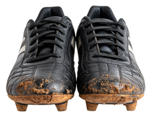  Muddy Black Soccer Cleats Front Angled View Isolated on White PNG