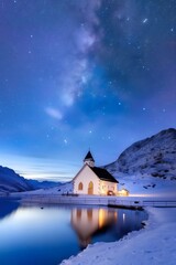 Milky Way shining over snowy church reflecting in a lake at night