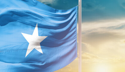 Somalia national flag waving in an amazing sunlight. National flag waving on mast.