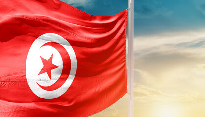 Tunisia national flag waving in an amazing sunlight. National flag waving on mast.