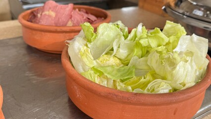 A luxurious hotel breakfast features an extensive selection of baked goods including croissants, bagels, muffins, pastries, breads, cookies, pancakes, waffles, scones, biscuits, donuts, rolls, Danish 