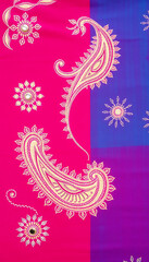  Hand-dyed magenta backdrop, block paisleys, and hand-stitched mirror-work.