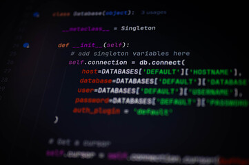 Close-up of Python code for connecting to a database using Singleton pattern, showing host, user,...