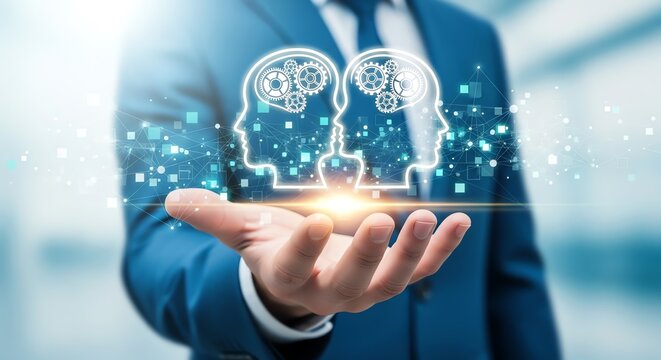 Businessman holding glowing digital heads with gears symbolizing AI collaboration and innovation.