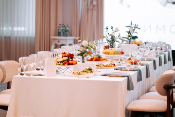 Elegant banquet setup with fresh food and decorations for a special event