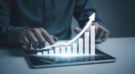 Business growth chart on tablet screen with hand touching, symbolizing success