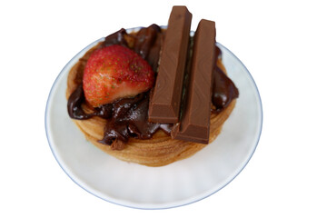 Delicious dessert showcases tempting strawberry, chocolate, and bar on waffle, radiating pure delight and irresistible appeal