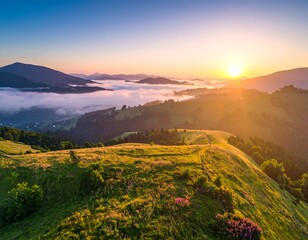 Sunrise over misty mountain range
