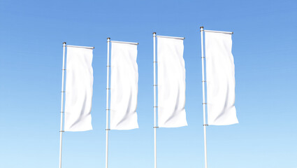 Four white flags are on poles in the sky